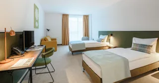 arche-hotel-lublin-dwuosobowy-z-dwoma-pojedynczymi-ozkami-standardowy-001.jpg